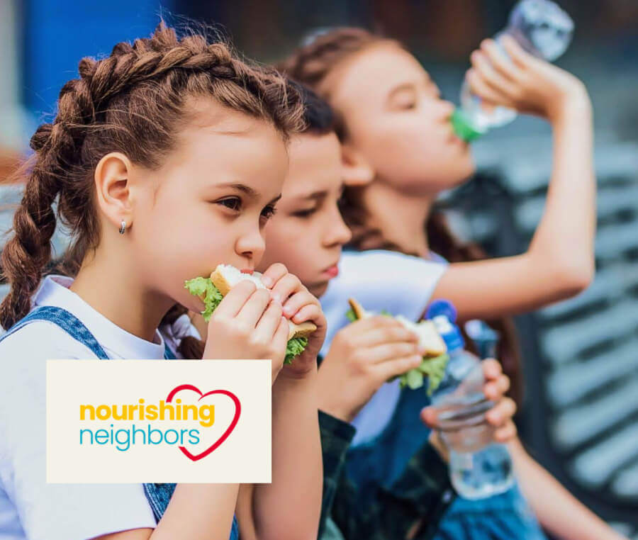 Case study cover image of three young kids eating school lunch