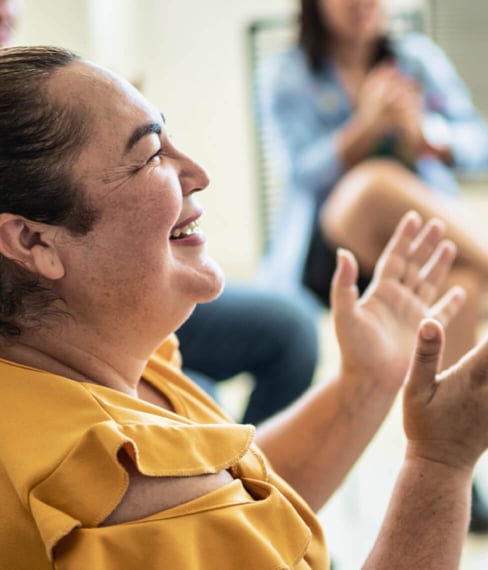 Case study cover image of a middle-aged employee looking to the right and smiling