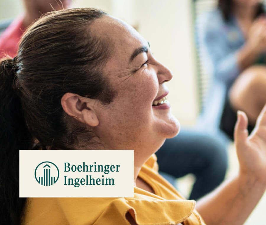 Case study cover image of a middle-aged employee looking to the right and smiling