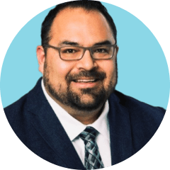 Headshot of Noah Atencio, Vice President of Community Impact from the Colorado Gives Foundation