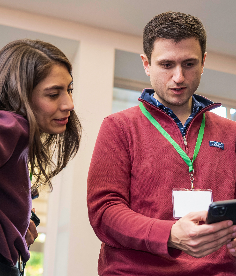 Two employees at a volunteering event